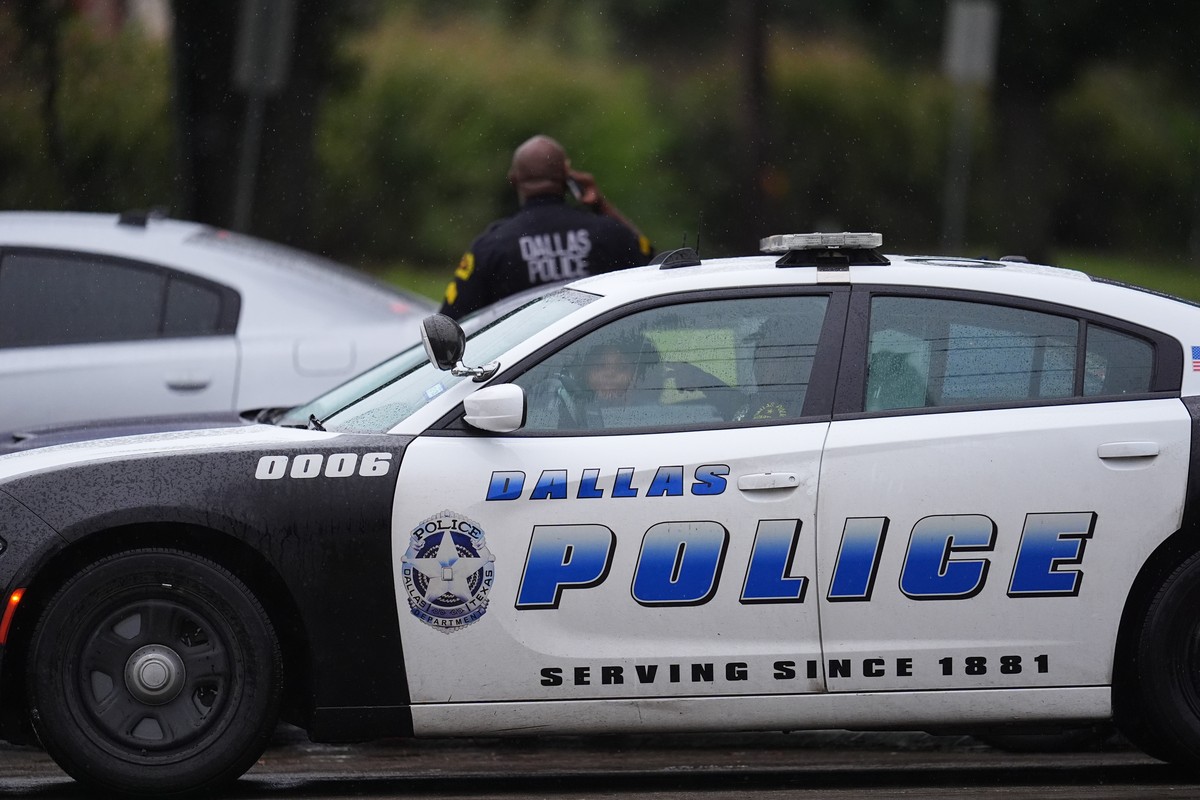 Police block off the street close to a U.S. Immigration and Customs Enforcement office after a reported shooting, in Dallas on Wednesday, Sept. 24, 2025. (AP Photo/Julio Cortez)
Immigration-Facility-S ...