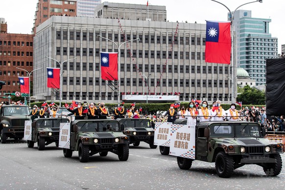 epa08734514 A handout photo made available by Taiwan's Military News Agency shows the National Day rally in Taipei, Taiwan, 10 October 2020. Taiwan National Day commemorates the start of the Wuchang U ...