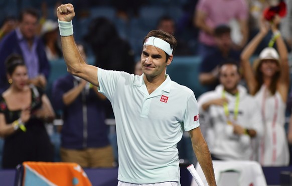 Roger Federer, of Switzerland, celebrates his 6-0, 6-4 win over Kevin Anderson, of South Africa, during the quarterfinals of the Miami Open tennis tournament Thursday, March 28, 2019, in Miami Gardens ...