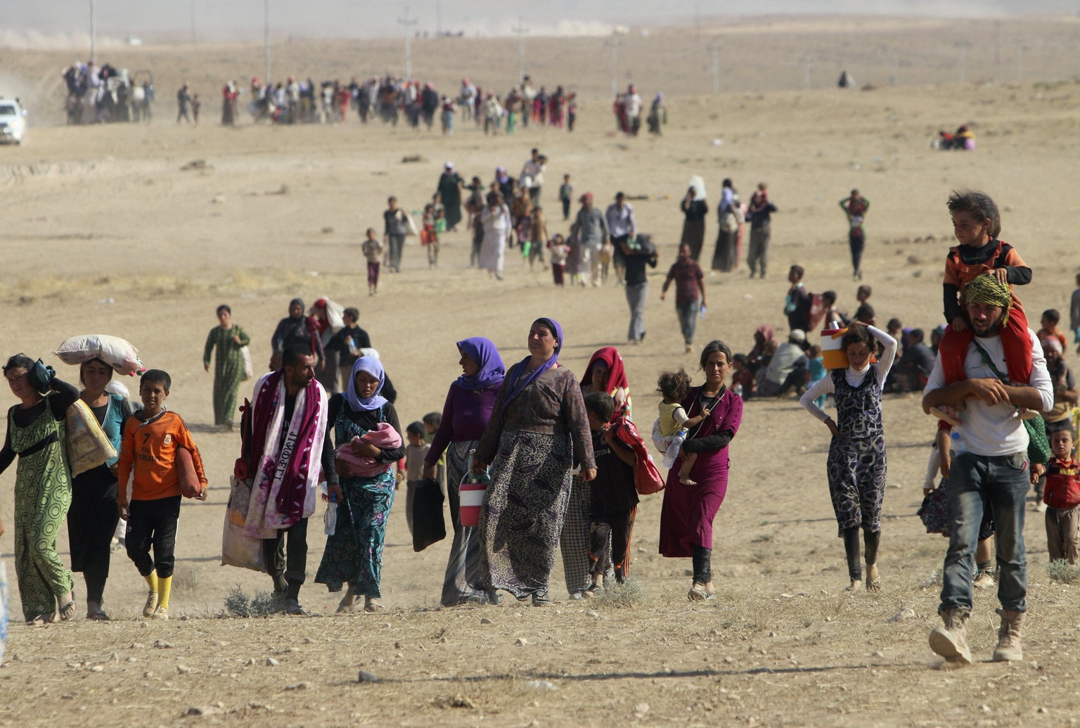 Menschen der religiösen Minderheit der Jesiden auf der Flucht im Norden des Iraks.