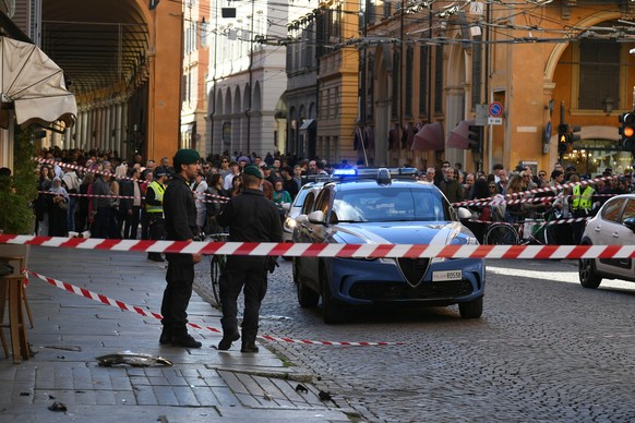 Financial Police patrol a scene after a car incident in a street of Modena, Italy, Saturday, May 16, 2026. (Lapresse via AP)
Italy Car Incident
