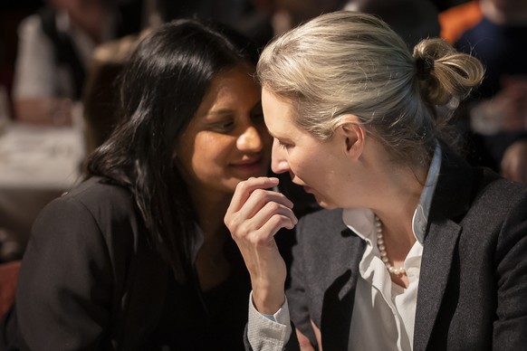 Vice-chairman of the right-wing political party Alternative for Germany (AfD), Alice Wedel, right, speaks to her partner, Swiss film producer Sarah Bossard during the 35th session of the traditional Swiss People's Congress...