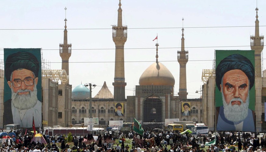 epa06014086 (FILE) - Thousands of Iranians loyal to the Iranian estabslihment attend a ceremony in the Khomeini mausoleum in south Teheran, Iran, 04 June 2005 (reissued 07 June 2017). A shooting and a ...