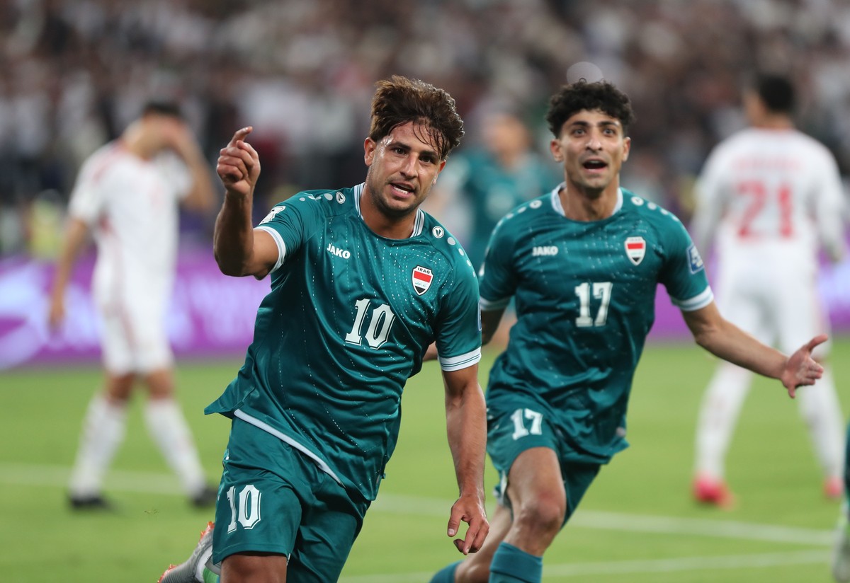 epa12534088 Mohanad Ali of Iraq celebrates scoring the 1-1 during the FIFA World Cup 26 AFC qualifier play-off 2nd leg between Iraq and the United Arab Emirates in Basra, Iraq, 18 November 2025. EPA/C ...