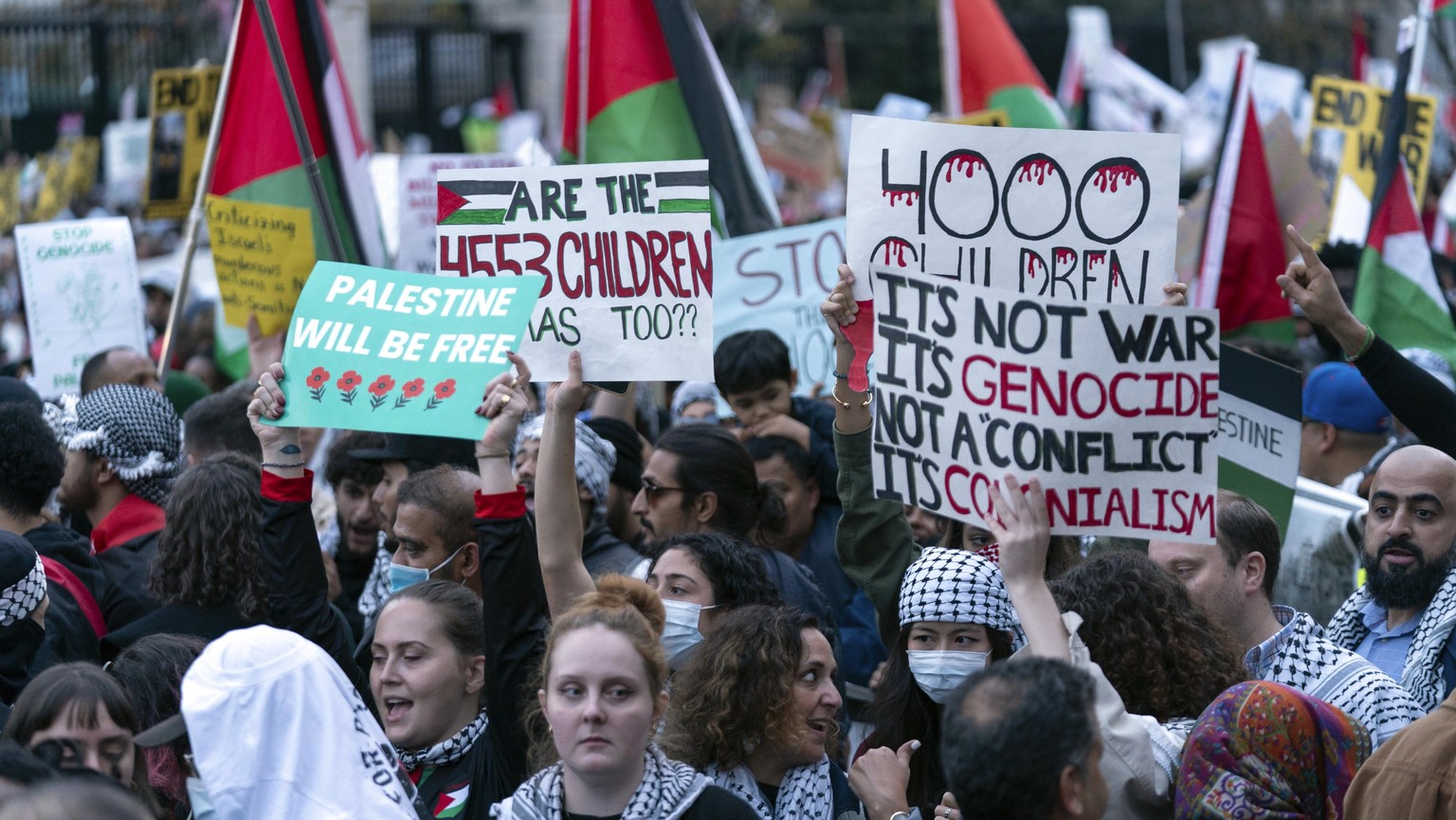 Anti-war activists protest outside of the White House during a pro-Palestinian demonstration asking for a cease fire in Gaza in Washington, Saturday, Nov. 4, 2023.( AP Photo/Jose Luis Magana)