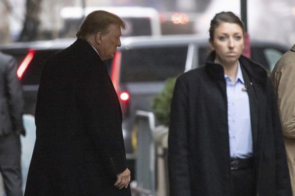 Former President Donald Trump leaves his apartment building, Friday, January 26, 2024, in New York.  The closing arguments begin on Friday in the defamation case against Trump, a day after the former president...