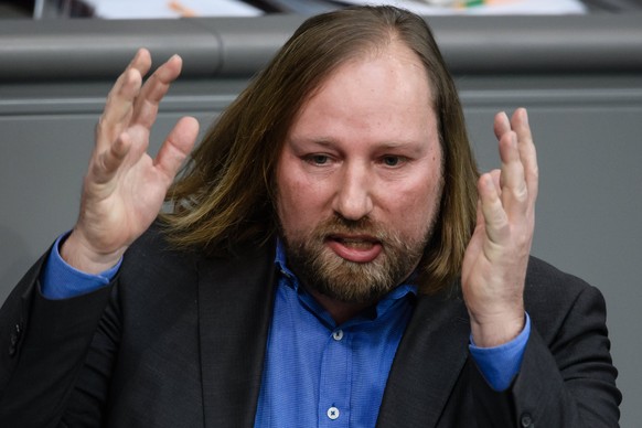 epa06618147 Greens party (Die Gruenen) parliamentary group co-leader, Anton Hofreiter, delivers a speech to the German Bundestag in Berlin, Germany, 21 March 2018. Merkel, in her government declaratio ...