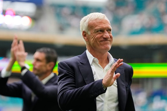 France head coach Didier Deschamps waves to fans as he walks off the pitch before the World Cup third-place playoff soccer match between France and England in Miami Gardens, Fla., Saturday, July 18, 2 ...