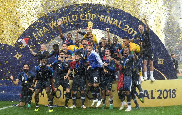 epa06891476 French player react with the trophy after winning the FIFA World Cup 2018 final between France and Croatia in Moscow, Russia, 15 July 2018.

(RESTRICTIONS APPLY: Editorial Use Only, not  ...