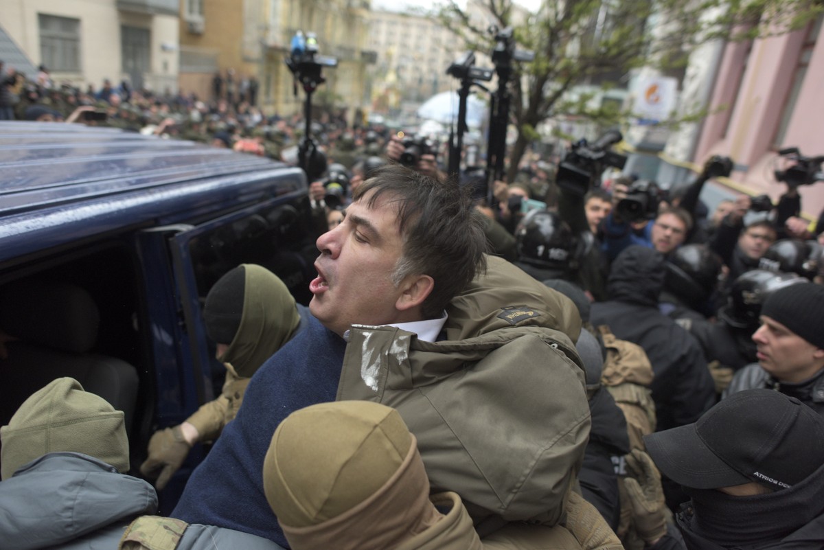 Ukrainian Security Service officers detain Mikheil Saakashvili at his house in Kiev, Ukraine, Tuesday, Dec. 5, 2017. Ukraine's intelligence agency on Tuesday detained the former president of Geor ...