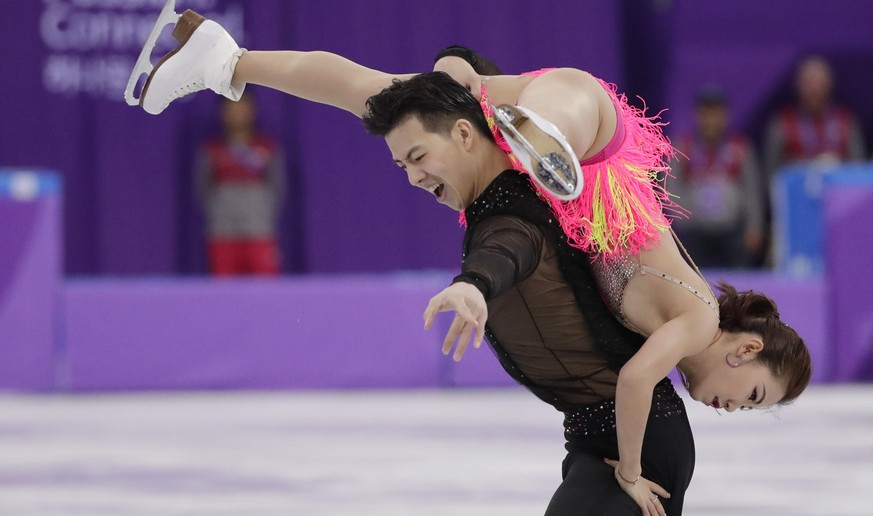 Wang Shiyue and Liu Xinyu of China perform during the ice dance short dance team event in the Gangneung Ice Arena at the 2018 Winter Olympics in Gangneung, South Korea, Sunday, Feb. 11, 2018. (AP Phot ...