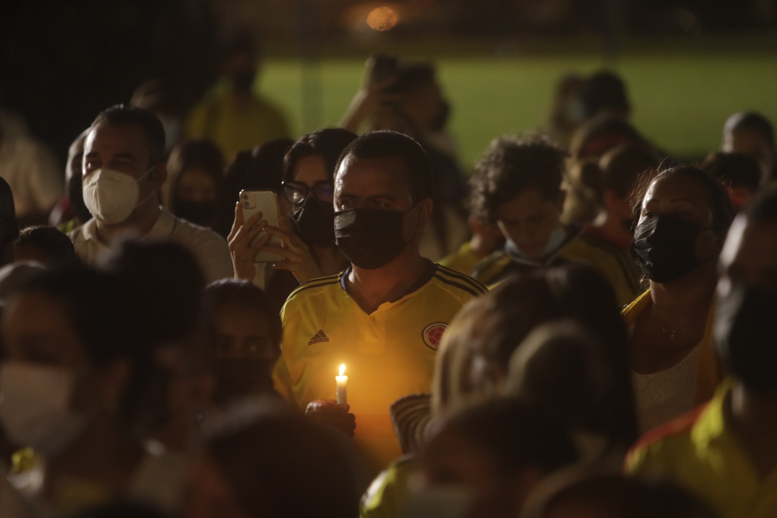 Colombians living in Panama gather during vigil in Panama City, Wednesday, May 5, 2021. The vigil is in support of protests that began last week over a tax reform proposal, and that continue despite P ...