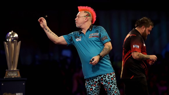 IMAGO / Action Plus

3rd January 2022: Alexandra Palace, London, England: The William Hill World Darts Tournament final between Peter Wright and Michael Smith; Peter Wright in action during his match  ...