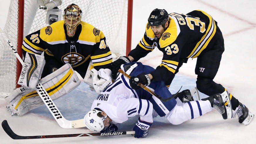 Boston Bruins defenseman Zdeno Chara (33) hits Toronto Maple Leafs center Zach Hyman (11) during the first period of Game 7 of an NHL hockey first-round playoff series in Boston, Wednesday, April 25,  ...