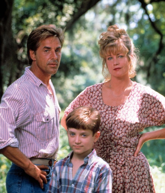 PARADISE, Don Johnson, Elijah Wood, Melanie Griffith, 1991, cBuena Vista Pictures/courtesy Everett Collection Buena Vista Pictures/Courtesy Everett Collection ACHTUNG AUFNAHMEDATUM GESCHÄTZT PUBLICATI ...