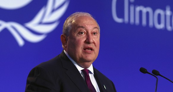 Armenian President Armen Sarkissian speaks during the UN Climate Change Conference COP26 in Glasgow, Scotland, Tuesday, Nov. 2, 2021. (Adrian Dennis/Pool Photo via AP)