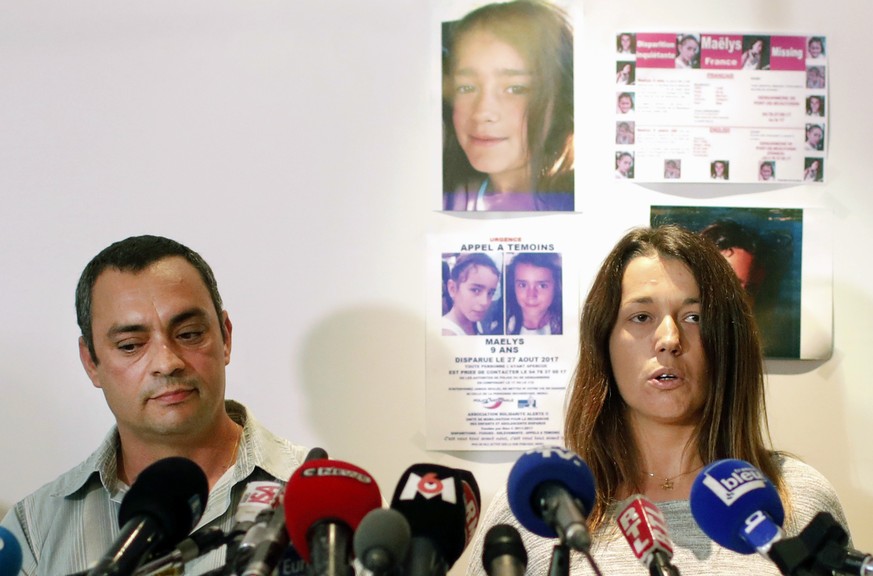 FILE - The father of killed girl, Maelys, Joachim de Araujo, left, and his wife, Jennifer, hold a press conference in Lyon, central France, Sept.28 2017. Nordahl Lelandais, goes on trial Monday Jan.31 ...