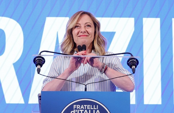 epa11401473 Italian Prime Minister Giorgia Meloni reacts as she speaks to journalists about the European Parliament election at the headquarters of the Brothers of Italy (Fratelli d&#039;Italia) in Ro ...