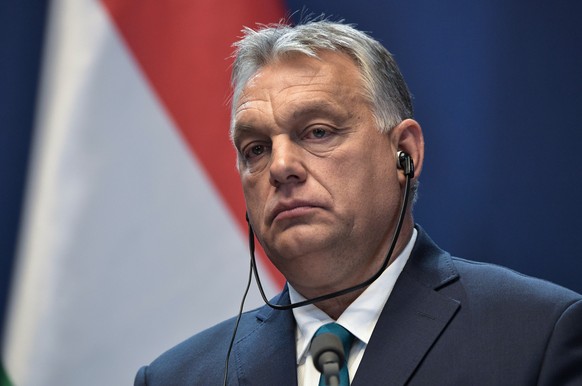 epa07960900 Hungarian Prime Minister Viktor Orban attend a joint news conference with Russian President Vladimir Putin (not pictured) following their talks in Budapest, Hungary, 30 October 2019. Russi ...