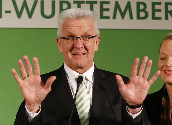 Governor Winfried Kretschmann, Green partys top candidate, smiles after the state elections in baden-Wuerttemberg at the parliament in Stuttgart, Germany, Sunday, March 13, 2016. (AP Photo/Matthias S ...