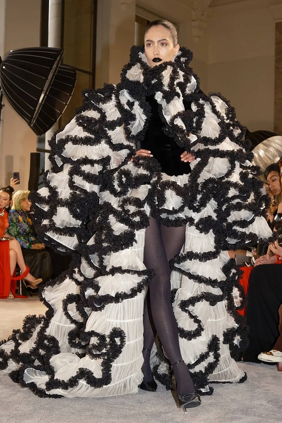 250708 -- PARIS, July 8, 2025 -- A model presents a creation by Schiaparelli during the Haute Couture Fall/Winter 2025-2026 fashion show in Paris, France, July 7, 2025. /Handout via Xinhua FRANCE-PARI ...