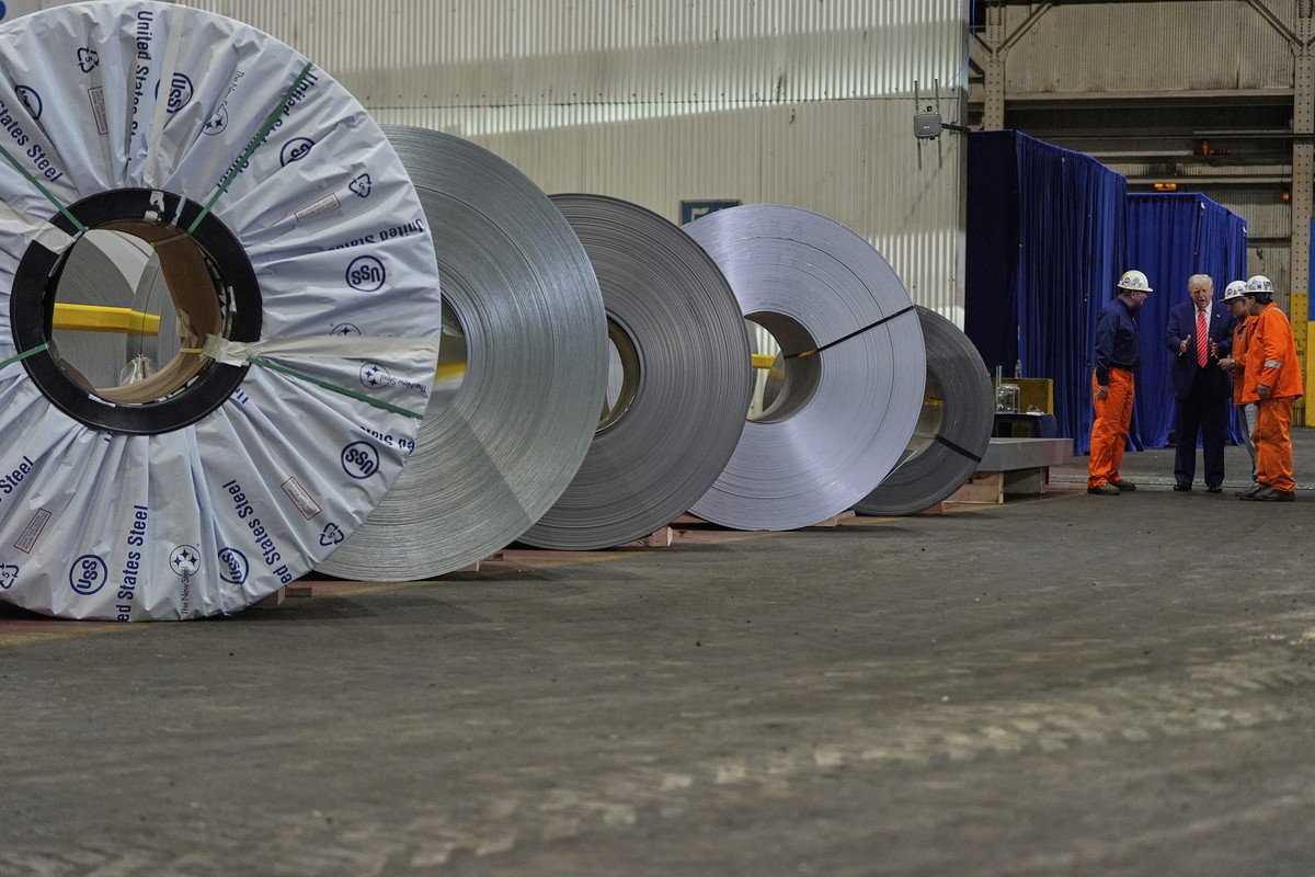 FILE - President Donald Trump talks to workers as he tours U.S. Steel Corporation's Mon Valley Works-Irvin plant, Friday, May 30, 2025, in West Mifflin, Pa. (AP Photo/Julia Demaree Nikhinson, Fil ...