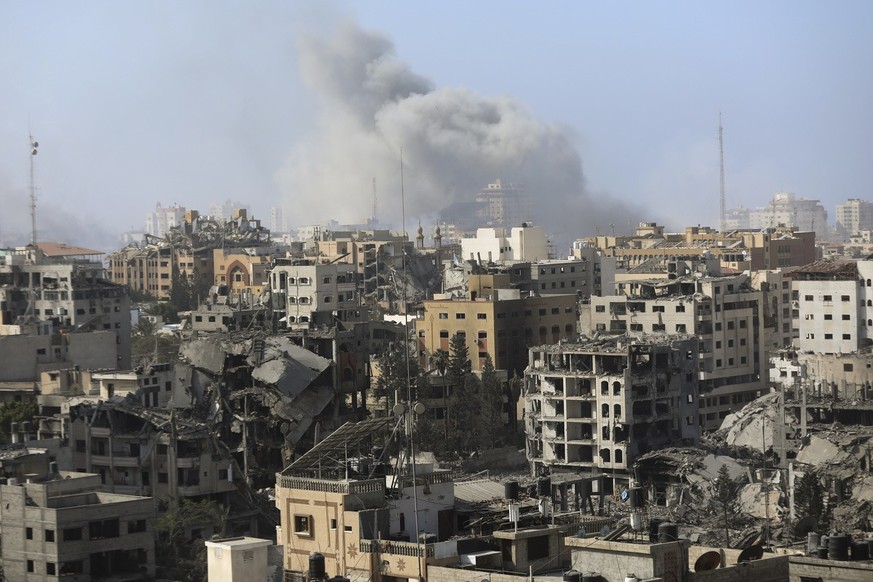 Smoke rises following Israeli airstrikes on Gaza City, Thursday, Nov. 9, 2023. (AP Photo/Abed Khaled)
