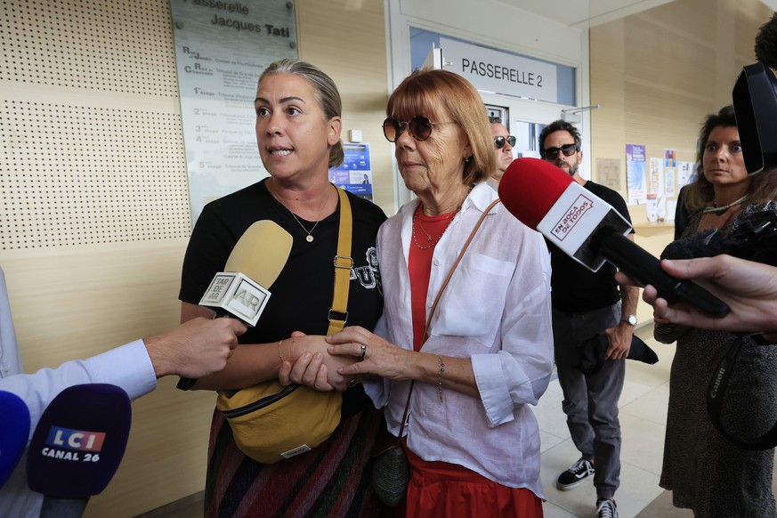 epa11587260 Gisele Pelicot (C), and her daughter Caroline Darian (L) speak with the media after leaving the criminal court in Avignon, France, 05 September 2024, where Pelicot&#039;s ex-husband stands ...