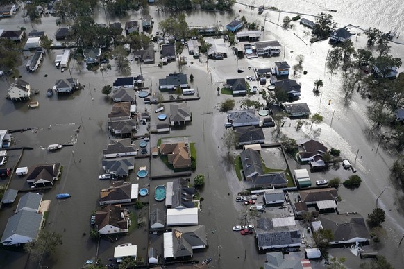 Homes are flooded in the aftermath of Hurricane Ida, Monday, Aug. 30, 2021, in Jean Lafitte, La. The weather died down shortly before dawn. (AP Photo/David J. Phillip)