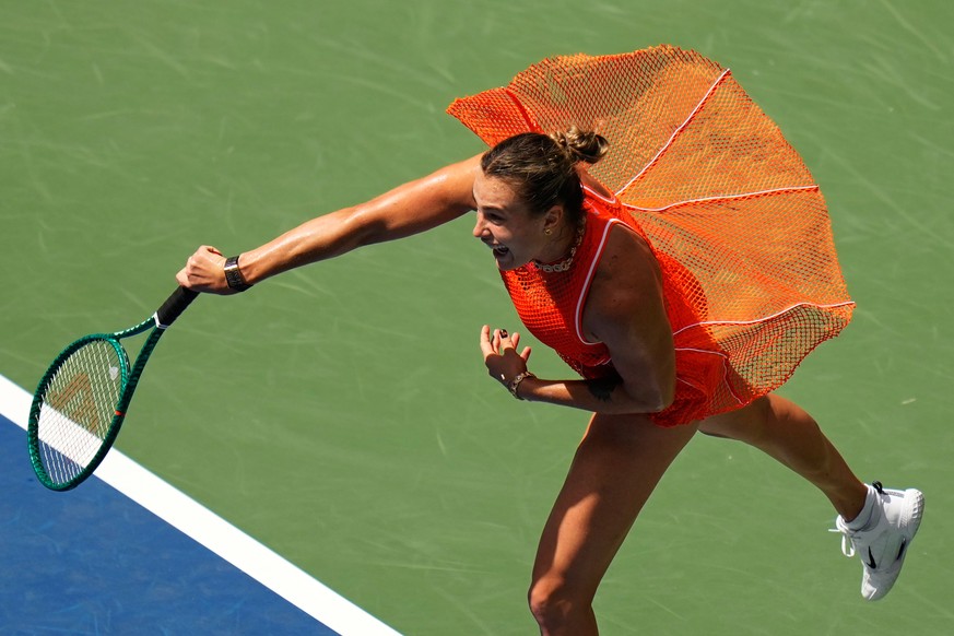 Aryna Sabalenka, of Belarus, follows through on a shot to Camila Osorio, of Colombia, during the first round of the U.S. Open tennis championships, Monday, Aug. 31, 2026, in New York. (AP Photo/Seth W ...
