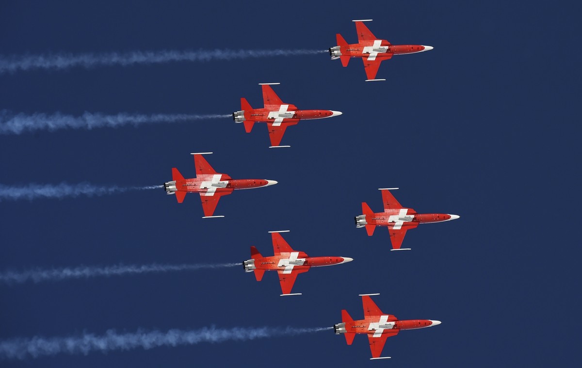 The Swiss Air Force Patrouille Suisse aerobatic team performs during an alpine ski, men's World Cup combined in Wengen, Switzerland, Friday, Jan. 18, 2019. (AP Photo/Marco Tacca)