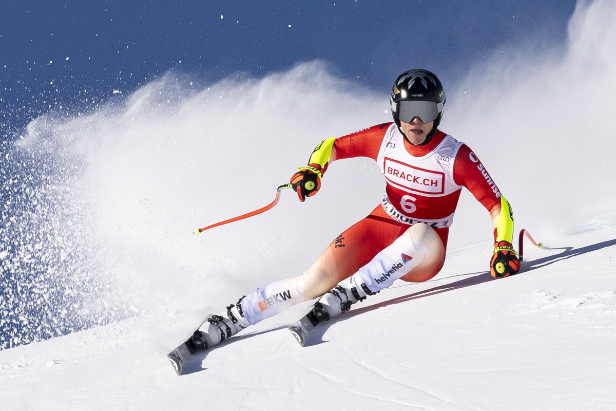 epa11787931 Lara Gut-Behrami of Switzerland in action during the women's Super-G race at the Alpine Skiing FIS Ski World Cup, in St. Moritz, Switzerland, 21 December 2024. EPA/JEAN-CHRISTOPHE BOT ...
