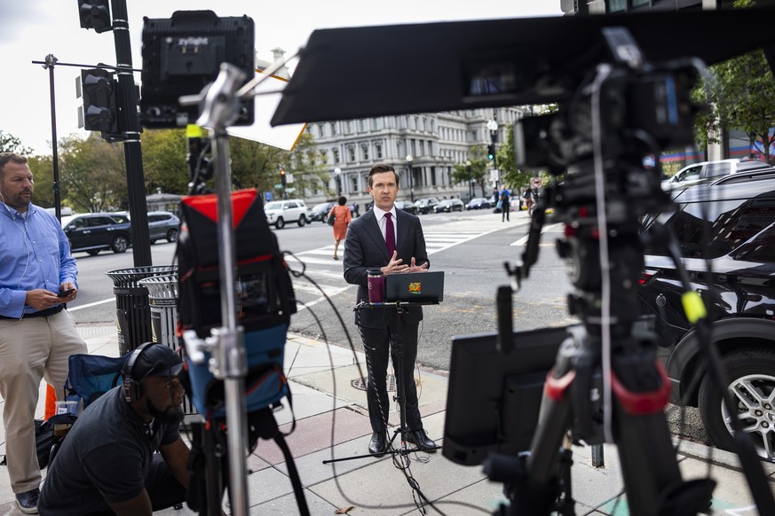 epa13254267 MS NOW reporter Vaughn Hillyard does a standup from outside the White House after US President Trump barred them, along with reporters from CNN and Politico, from entering the White House  ...
