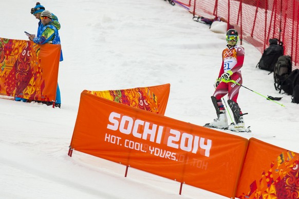 Luca Aerni of Switzerland reacts after a crash during the first run of the men&#039;s slalom race at the XXII Winter Olympics 2014 Sochi in Krasnaya Polyana, Russia, on Saturday, February 22, 2014. (K ...