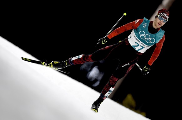 epa06546050 Tim Hug of Switzerland in action during the Cross Country portion of the Nordic Combined Individual Large Hill / 10 km competition at the Alpensia Cross Country Centre during the PyeongCha ...