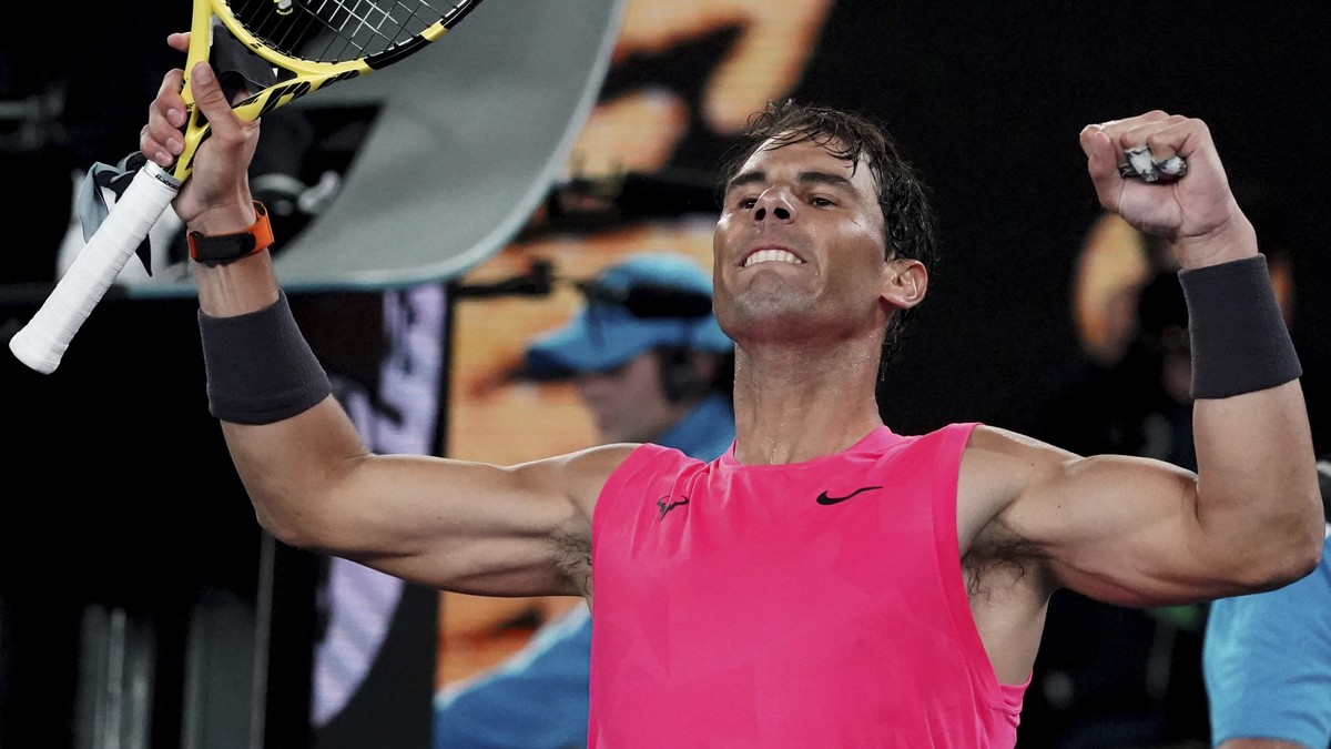 Spain's Rafael Nadal celebrates after defeating Australia's Nick Kyrgios in their fourth round singles match at the Australian Open tennis championship in Melbourne, Australia, Monday, Jan.  ...
