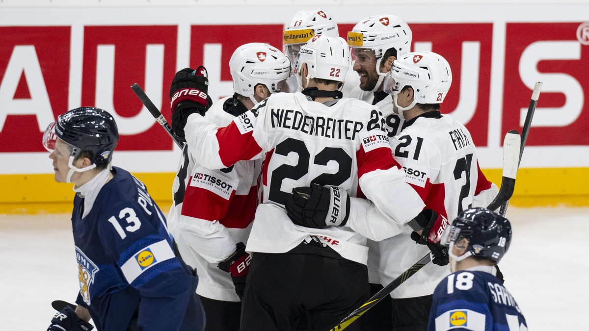 Switzerland?s player celebrate their goal to 2-0 during the Ice Hockey World Championship group A preliminary round match between Switzerland and Finland in Prague at the O2 Arena, Czech Republic, on  ...