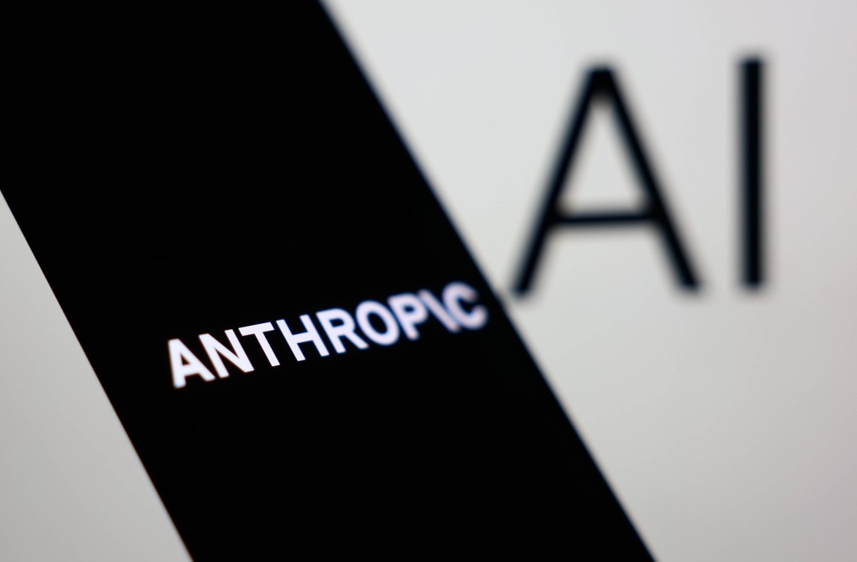 Anthropic AI Photo Illustrations Anthropic logo displayed on a phone screen and AI sign displayed on a screen are seen in this illustration photo taken in Krakow, Poland on December 26, 2025. Krakow P ...