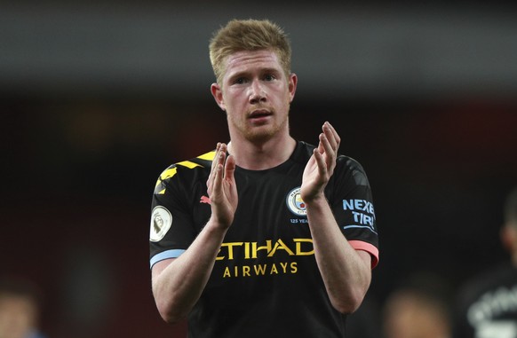 Manchester City's Kevin De Bruyne applauds fans at the end of the English Premier League soccer match between Arsenal and Manchester City, at the Emirates Stadium in London, Sunday, Dec. 15, 2019 ...