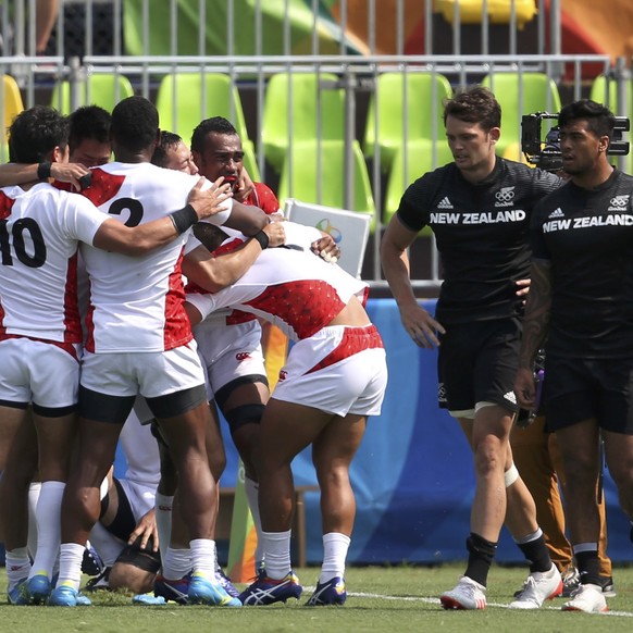 2016 Rio Olympics - Rugby - Preliminary - Men&#039;s Pool C New Zealand v Japan - Deodoro Stadium - Rio de Janeiro, Brazil - 09/08/2016. Japan celebrates after defeating New Zealand. REUTERS/Alessandr ...