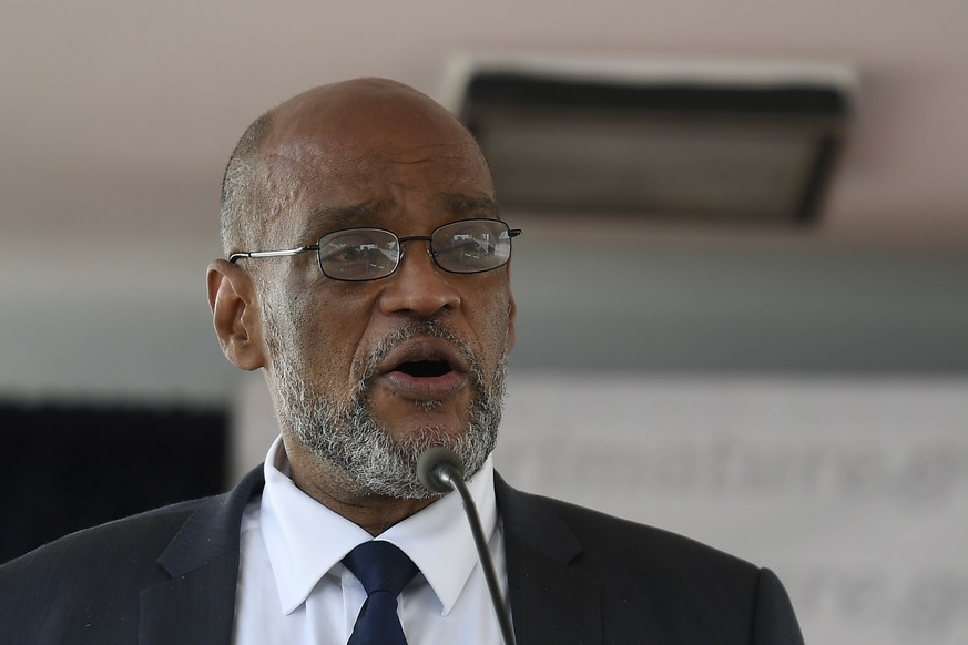 FILE - Ariel Henry speaks during his appointment as the new Prime Minister in Port-au-Prince, Haiti, Tuesday, July 20, 2021, weeks after the assassination of President Jovenel Moise at his home. Prime ...