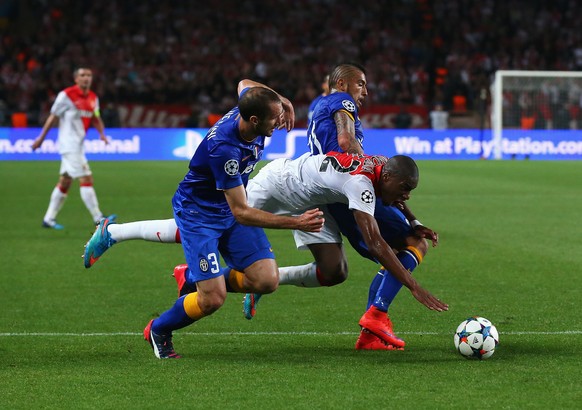 MONACO - APRIL 22: Geoffrey Kondogbia of Monaco goes down in the penalty area after a challenge by Giorgio Chiellini (L) and Arturo Vidal of Juventus during the UEFA Champions League quarter-final sec ...