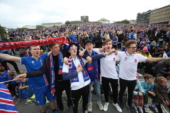 epa05395235 Iceland supporters during a public viewing in Reykjavik, Iceland, 27 June 2016, as they watch the UEFA EURO 2016 round of 16 match between England and Iceland. EPA/EYTHOR ARNASON ICELAND O ...