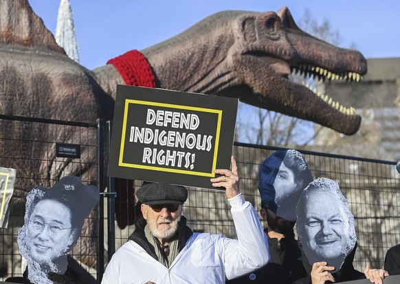 IMAGE DISTRIBUTED FOR AVAAZ - Actor and activist James Cromwell, second left, called on world leaders to defend Indigenous rights in the talks at COP15 in Montreal, Quebec, Canada, Thursday, Dec. 15,  ...