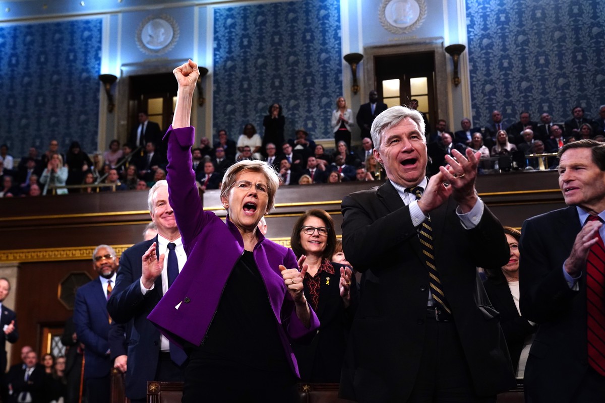epaselect epa11205930 Democratic Senators Elizabeth Warren from Massachusetts (L) and Sheldon Whitehouse from Rhode Island (L) cheer as US President Joe Biden delivers his third State of the Union add ...