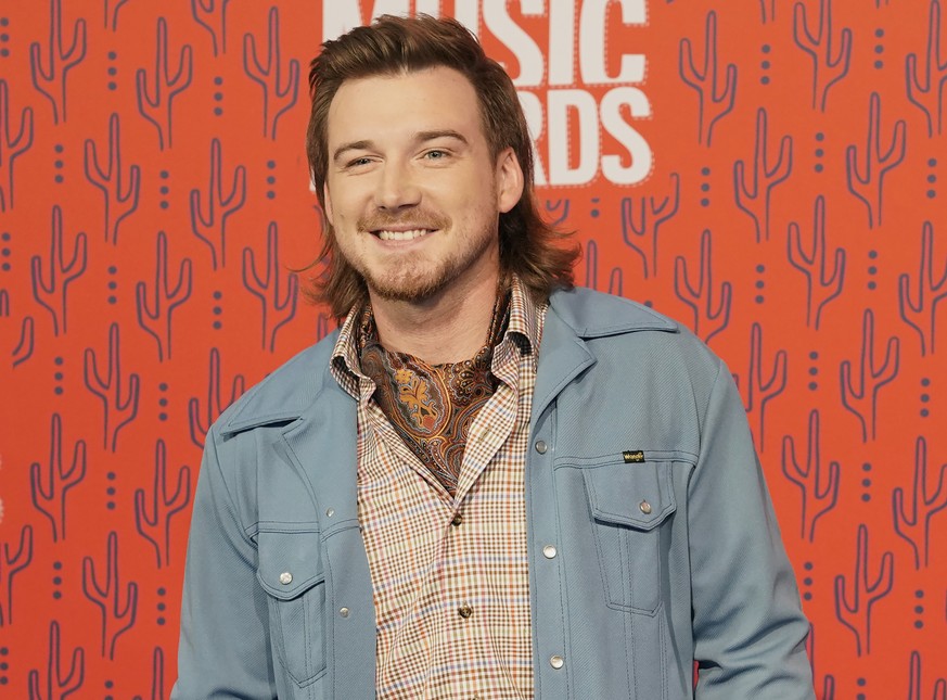 FILE - In this June 5, 2019, file photo, Morgan Wallen arrives at the CMT Music Awards on at the Bridgestone Arena in Nashville, Tenn. Wallen has been arrested after police say he threw a chair off th ...
