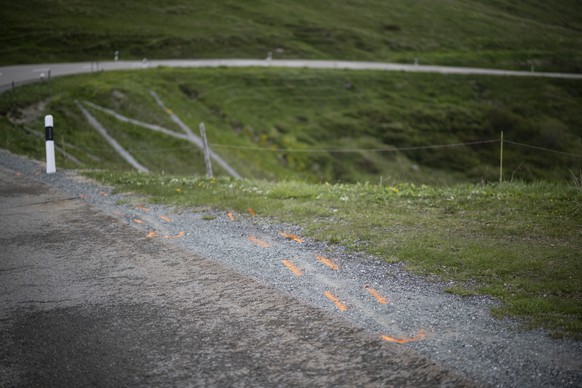 epa10694519 View of the site where Gino Maeder from Switzerland of Bahrain Victorious and Magnus Sheffield from the USA of Ineos Grenadiers crashed during the descent from the Albula pass in the 5th s ...