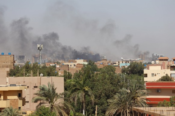 epa10579976 Smoke rises over the city during ongoing fighting between the Sudanese army and Rapid Support Forces (RSF) paramilitaries in Khartoum, Sudan, April 19, 2023. A power struggle broke out…