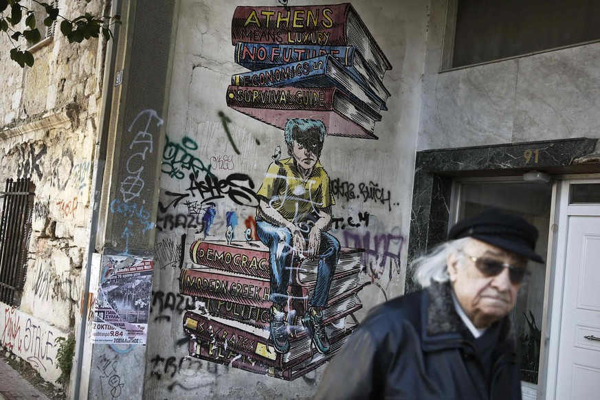 Graffiti in Athen: Protest gegen die Austeritätspolitik. 5,7 Milliarden Euro will das Land insgesamt einsparen.