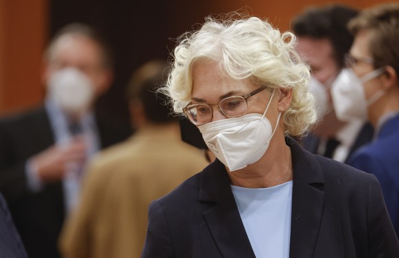 German Defense Minister Christine Lambrecht arrives for the weekly cabinet meeting at the Chancellery in Berlin, Germany, January 26, 2022. (Michele Tantussi/Pool via AP)